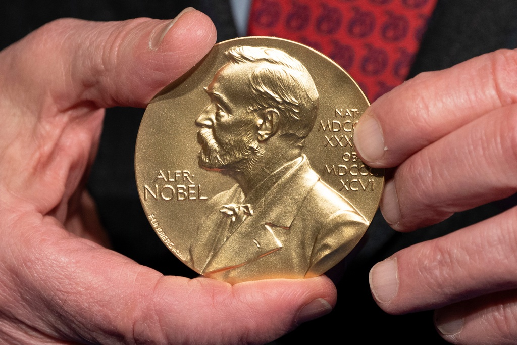 A close-up view of a Nobel Prize medal.